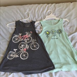 Two justice tank tops!